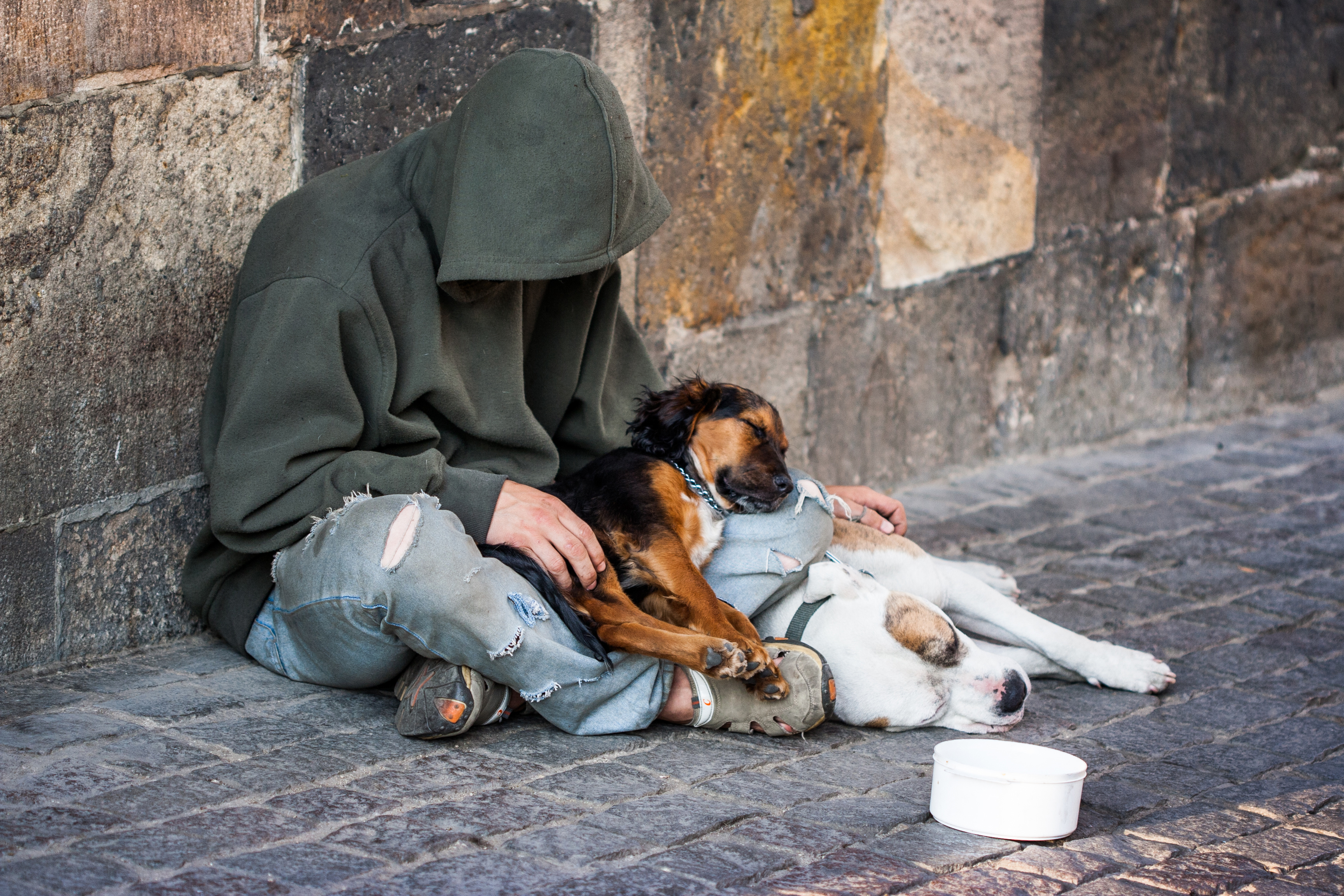 beggar with two Dogs near Charles Bridge, Prague